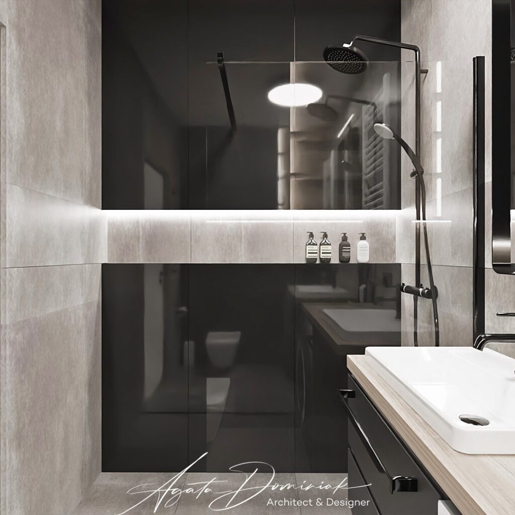 Łazienka z czarnymi płytkami i ścianką walk-in prysznica